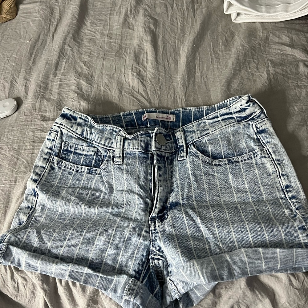 Blue and white pinstripe shorts, low rise